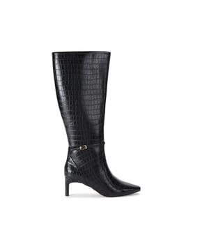 This Carvela Impress High Boot features an across embossed upper in black. There is a thin ankle strap with gold buckle. This product features All Day Long technology.