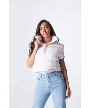 Step up your style game with our Pink Dogtooth Padded Gilet. Perfect for elevating a basic 'fit, team with a white tee and jeans! Featuring a zip fastening.&nbsp;