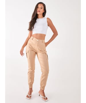 Featuring a PU material and buckle detailing. Team our Cuffed Cargo Trousers with your existing wardrobe pieces for a blogger-worthy look.