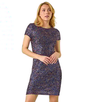Multi Sequin Dress from Roman. Add a touch of glamour to your evening wardrobe with our dazzling sequin bodycon dress. Crafted from a comfortable sequin on mesh fabric, this dress features a flattering round neckline with short sleeves. The dress finishes above the knee in a sleek bodycon shape, perfect for showing off your curves. It is finished with a concealed back zip fastening for ease of wear. Style with heels and a bolero for a special occasion, and you're ready to shine all night long!