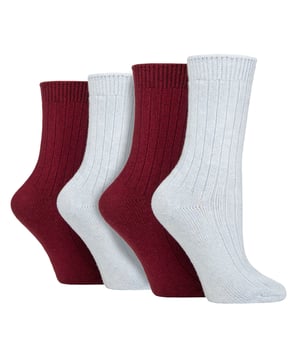 These ladies’ Wildfeet Cashmere Socks are the socks of luxury and comfort. Made from a blend of natural wool, viscose, and cashmere, they are designed to provide warmth and cosiness throughout the day, whether you're running errands or relaxing at home. These socks offer the perfect balance of luxury and practicality with a blend of wool, viscose, and cashmere. The soft and comfortable material provides warmth and insulation to keep your feet cosy in the cold weather while also being breathable and moisture-wicking. The combination of fibres makes these socks more durable, ensuring long-lasting wear, while the ribbed leg enhances comfort. The crew length and medium gauge thickness make them a good choice for any leisure shoes or boots, adding a touch of comfort to any outfit. These 4 pairs of Wildfeet Cashmere Socks come in 2 gift boxes and attractively wrapped with a satin ribbon bow, which makes them ideal for gifting to friends or family. Maybe even a last minute Christmas present or stocking fillers? Wild Feet is a range of socks featuring cool designs, bold colours and quirky catchphrases - from pugs and penguins, to lions and llamas! Choose from a range of styles for men and ladies, from dress to trainer socks. There are even some sporty styles available! There are 14 colours to choose from. They come in one size Ladies 4-8 UK, are made from 37% Wool, 27% Viscose, 24% Polyamide, 11% Cashmere, 1% Elastane and are machine washable.