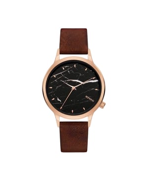 Komono KOM-W2765 - Reloj para mujer cuarzo acero inoxidable• material: acero inoxidable• cristal: minèral• pulsera: cuero• correa: oro rosado• resistencia al agua: 30 m (3 ATM)• tamaño de la caja: 36 mm