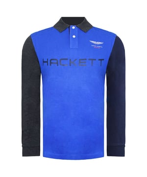 The Hackett Aston Martin Racing Panel Men's Blue Polo Shirt is a stylish and sporty piece of clothing that combines the elegance of Hackett London with the racing heritage of Aston Martin. This polo shirt is designed for individuals who appreciate both fashion and motorsports. Here are the key features of this exceptional blue polo shirt:

 Premium Quality:  Crafted with meticulous attention to detail, this polo shirt is made from high-quality materials to ensure durability, comfort, and a polished appearance.

 Aston Martin Racing Collaboration:  The shirt is a result of the collaboration between Hackett London and Aston Martin Racing, two iconic British brands. This partnership seamlessly combines the world of fashion and motorsports, resulting in a shirt that exudes luxury and performance.

 Sporty Panel Design:  The shirt features a sporty panel design with contrasting colors, creating a dynamic and eye-catching look. This design element is inspired by racing aesthetics and adds a touch of excitement to the shirt.

 Classic Blue Color:  The polo shirt is presented in a classic blue color that signifies both style and versatility. Blue is a timeless choice that complements a wide range of casual and sporty outfits.

 Polo Collar:  The shirt features a traditional polo collar with a buttoned placket, offering a smart-casual appearance that's suitable for various occasions.

 Short Sleeves:  With short sleeves, this polo shirt provides comfort and freedom of movement, making it ideal for active lifestyles and warm-weather wear.

 Aston Martin Branding:  Look for discreet Aston Martin Racing branding, which may include logos or emblems, highlighting the authenticity of the collaboration and the shirt's exclusivity.

<
