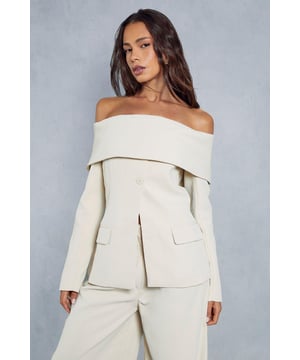 Off-the-shoulder bardot neckline with button accents 
 Fitted bodice and relaxed, elongated sleeves  
 Smooth, woven fabric with a slight sheen 
 Asymmetrical hemline and dart detailing 

This fitted bardot blazer top from Misspap brings effortless style to casual occasions. The off-the-shoulder bardot neckline and front button accents create an elegant, flattering silhouette. Pair this top with high-waisted jeans or a skirt to complement the asymmetrical hemline. The smooth, woven fabrication drapes beautifully, while the structured shoulders and dart detailing shape a feminine hourglass figure. Wear this versatile top for a lunch date, social gatherings with friends, or a casual night out. Elevate the look with heeled sandals, or keep it relaxed with trainers. With its combination of comfort and polish, this blazer top transitions seamlessly from day to night.