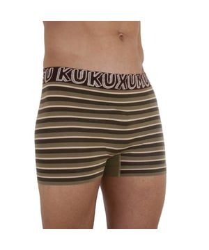 Boxer Kukuxumusu.
 Illustrations of the brand as decoration on the boxer briefs.
 Elastic waistband with the brand name printed consecutively.
 Matching seams.
 Composition: 85% Cotton, 9% Polyamide, 6% Elastane
 Care:
Care:
 - Machine wash maximum 30ºC.
 - Do not use bleach.
 - Iron at low temperature.
 - Do not use dryer.
 - Do not dry clean.