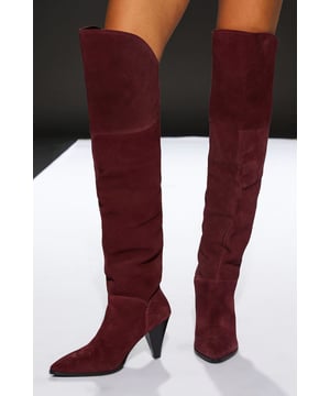 Luxurious suede over-the-knee boots
        Sleek pointed toe design
        Striking conical heel between 7 and 9cm
        Versatile day-to-night style
        Smooth, form-fitting silhouette
    
    Step into sophistication with these stunning over-the-knee boots from RUNWAY 1.8.1.8. The sumptuous suede texture and sleek silhouette create a look that's both elegant and edgy. Perfect for transitioning from day to night, these boots offer versatility in spades. Pair them with a flowing maxi dress for a romantic evening ensemble, or style with skinny jeans and an oversized jumper for a chic daytime look. The conical heel adds just the right amount of height without sacrificing comfort, making these boots ideal for long days at the office or nights out on the town. Whether you're dressing up or down, these boots will add a touch of glamour to any outfit, ensuring you stand out from the crowd with effortless style.