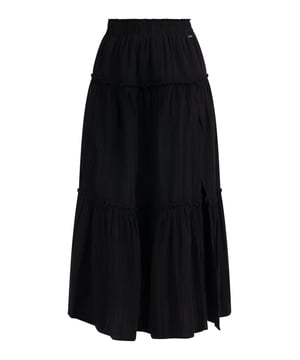 Dieser Rock von DreiMaster Vintage sorgt für sommerliche Vibes. Die gestufte A-Linien-Silhouette in Kombination mit den Volants sorgt für einen romantisch-verspielten Look, während das Baumwollmaterial mit feiner Struktur für ein angenehmes Tragegefühl verantwortlich ist. Ein seitlich versetzter Schlitz auf der Vorderseite verleiht dem Rock einen lässigen Twist. Kombiniert mit Stiefeln oder Sandalen ist dieser Rock eine Bereicherung für Ihre Sommergarderobe.  Felsen