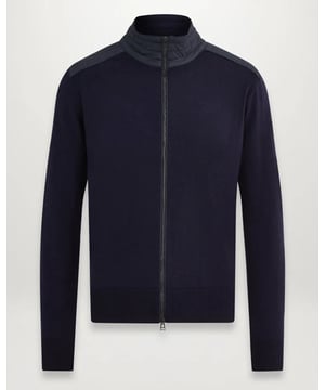 Looking for a truly versatile layer? The Kelby zip cardigan has you covered. Wear it open as a light outer layer or zipped up through its channel-quilted stand collar. Crafted from virgin merino wool, it’s built to see you through the seasons.

Virgin merino wool with polyester detailing
Channel quilted shoulder reinforcement detailing
Ribbed cuffs and hem
Belstaff phoenix patch on left sleeve
Two-way zip centre front closure
Non-mulesed wool

Body: 100% Wool, Woven: 100% Polyester, Filling: 100% Polyester
105598