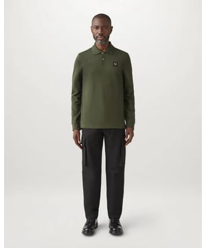 Mens Belstaff Long Sleeved Polo Shirt in green.- Ribbed collar.- Long sleeves with ribbed cuffs.- Two button front placket.- Belstaff phoenix patch on body.- Textured cotton pique.- 100% Cotton.- Ref: 101397TLGRN