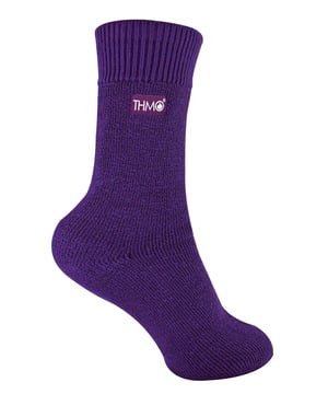 Keeping your little ones warm, comfortable and protected when they're outside is important. That's why we've designed THMO Kids Thermal Socks. The perfect pair to keep your Children’s feet nice and cosy. These socks have a stretchy comfort top that moulds to their leg to reduce constriction rings and tightness, which allows for regular circulation. As well as all day comfort, these socks feature a cushioned foot bed providing feet with an extra layer of support. They have been double brushed on the inside to maximise warmth by trapping warm air and keeping it close to their feet and legs. This inner brushing also softens the inside of the sock making it a great choice for keeping them warmer for longer. The ribbed welt at the top of the sock has been designed to rest to the natural contours of their legs. This wide soft top provides all day comfort and will reduce the chances of nasty constriction rings developing around their legs. These Children’s Thermal Socks come in 4 colour options: Black, Navy, Fuchsia, Purple. They also come in 3 kids size options: 9-12 UK, 12-3 UK and 4-5.5 UK, The THMO badge is also heat transferred onto the side of the socks. These socks come in 4 different colours and are made from 93% Acrylic, 6% Polyamide, 1% Elastane. They are available in 3 Children’s sizes 9-12 UK(27-30 EUR 10-1 US), 12-3 UK (30-36 EUR, 13-4 US) and 4-5.5 UK(37-38.5 EUR, 5-6.5 US). They are machine washable at 40.