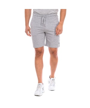 Sports shorts U.S. POLO ASSN.
 Regular fit cotton Bermuda shorts.
 Elastic and adjustable waistband with drawstring,
 Two open pockets on the sides.
 One open back pocket.
 Brand logo on the front.
 Seams seen in tone.
 Composition: 100% cotton
 Care:
Wash at maximum temperature 30º.
 Iron at low temperature.
 Do not use bleach.
 Do not use dryer.
 Do not dry clean.