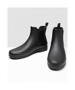 With a slimmer fit ideal for city-living, the Women's Refined Chelsea features a tailored shape and moulded footbed for everyday wear. A rework of the classic ankle boot, each boot is ready for rain and handcrafted from natural rubber which has been vulcanised for superior protection. Retaining the iconic features of the traditional Chelsea, elasticated gussets and a nylon pull tab make for easy wear. Perfect for everything from city commuting to last minute lunches, this waterproof boot in classic black is a wet weather essential.
We recommend that all Hunter Chelsea boots be worn with Hunter Chelsea socks, which have been technically designed to protect the wearer's skin from contact with rubber in specific areas.
&nbsp;

&nbsp;

Waterproof
Handcrafted
Polyester lining
Elastic side gussets and nylon pull-tab
Rubber outsole with Hunter Original tread pattern
Moulded foot bed for enhanced comfort and support
Crafted from natural vulcanised rubber with matte finish

&nbsp;