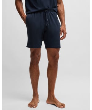 Easy-wear shorts with a regular rise by BOSS. Featuring an embroidered logo, this pair is crafted in soft stretch jersey with branded drawcords. This product is partly made with organic cotton.

Covered waistband
Drawstring
Pockets bottom front: Side pockets

95% Cotton, 5% Elastane
50515367
 