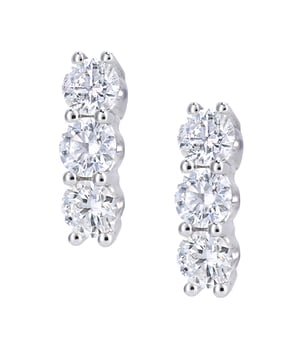 18K (750) witgoud: 1,1 gram; # Diamant: 0,5 ct