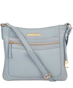 The 'Lewes' cross body bag from Pure Luxuries London, is crafted from naturally milled leather with a beautifully distinct fine-grain feel. A zip-over top secures a gorgeous, 100% natural cotton-lined interior with two slip pockets. On-the-go storage comes in the form of an exterior zipped pocket and two slip pockets, complemented by an adjustable and matching leather shoulder strap. Furnished with gold coloured metal fittings and the elegant Pure Luxuries London charm and logo plate.