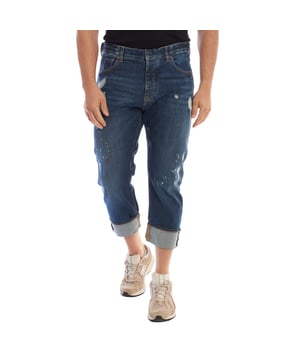 Emporio Armani trousers with a straight cut, combining a classic and sophisticated style with contemporary details.

 Crafted from untreated dark denim, this five-pocket design stands out for its authentic and versatile look.

 Its hook and button closure ensures a firm and comfortable fit, while the brand's metal logo, discreetly placed on one of the back pockets, adds a touch of elegance.

 The wide visible hems at the ankles give it a distinctive character, ideal for those looking for a timeless garment with personality, perfect for a casual look inspired by urban and sophisticated styles.
 Composition: 98% Cotton, 2% Elastane
 Care:
- Machine wash on gentle cycle.
 - Use similar colors in the wash.
 - Avoid the use of bleaches.
 - Dry at low temperature in the dryer.
 - Iron at low temperature.
 - Do not dry clean.