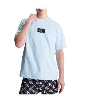 Mens Calvin Klein Lounge T- Shirt in blue.- Crewneck.- Short sleeves.- Signature tape inside the collar.- Iconic Calvin Klein monogram logo on the chest.- Regular fit.- Ref: 000NM2399ECAV