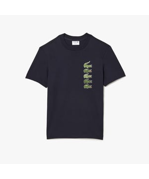 Holidays season reveals two new house codes takeover: Monogram & Croc Timeline Regular fit  natural ease on body Short-sleeves t-shirt made with a heavy organic cotton jersey 5 crocodiles plastisol and 3D print representing the past and present generations Embroidered 3 cm green crocodile sewn on at back neck