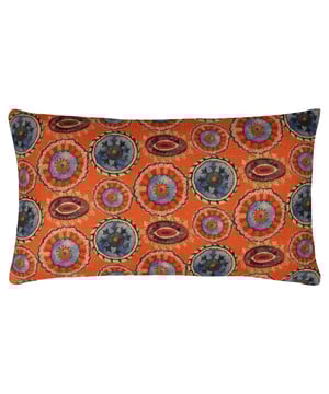 Influenced by German Fraktur designs, combining tropical with a hint of the East using paisley prints. The Akamba Tribal cushion features a hand-painted modern take on a tribal print. Complete with a rustic colour palette, a complementary linen-look background and piped trim. This cushion is one-of-a-kind and will stand out even more against your soft furnishings.