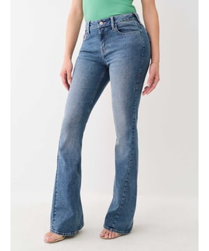 Stay on trend in the Joey Mid Rise Flare Jean. This pair of women’s jeans feature a comfortable mid-rise waist, zip fly, belt loops, twisted inseam on the flare leg, and pink single needle stitching. Finished with horseshoe detailing on the back flap pockets