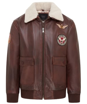 Inspired by classic aviator styles and Top Gun aesthetics, this men's brown bomber jacket is crafted from premium cowhide leather for durability and style. It features two iconic aviation badges on the chest, adding a touch of character to its timeless design. The detachable shearling collar offers versatility for different weather conditions, while the rib-knit cuffs and hem provide a tailored fit. With a zip-up front closure and spacious front pockets, this jacket is both functional and fashionable. Perfect for those seeking a bold, vintage-inspired look with modern functionality.Detachable shearling collar for versatile seasonal wear
Made from premium cowhide leather for durability and a luxurious feel
Two aviation-inspired badges on the chest for a Top Gun-style look
Detachable shearling collar for adaptable seasonal wear
Rib-knit cuffs and hem for a snug, tapered fit
Classic aviator bomber design with Air Force A2 inspiration
Spacious 2 front pockets  2 side angled pockets and 2 inner pockets for convenient storage
Secure zip-up front closure for ease of wear
Ideal for aviation enthusiasts or fans of vintage military styles
Perfect for casual outings or statement outerwear