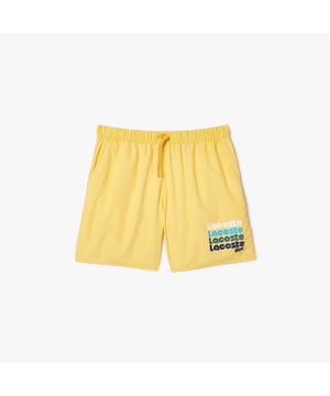 Mid Length Washed Effect Ombré Print Swim Trunks Recycled Polyester Taffeta Elasticated waistband with drawstring 2 pockets on sides  1 pocket on back Mesh lining Embroidered crocodile on front