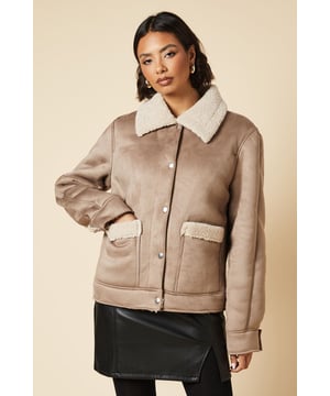 Cosy shearling-style collar for added warmth
        Functional front pockets with contrasting trim
        Button-through front closure for easy wear
        Contrasting trim details along seams and edges
        Relaxed fit design perfect for layering
    
    Embrace the classic aviator style with this chic and versatile jacket from Dorothy Perkins. The tall design offers extra coverage, making it ideal for those cooler days. Style it effortlessly with a mini skirt and opaque tights for a trendy brunch look, or pair it with your favourite jeans for a casual day out. The neutral hue allows for endless outfit combinations, whether you're meeting friends for coffee or attending a relaxed family gathering. For a polished ensemble, layer it over a simple jumper and add ankle boots. This jacket is a must-have piece that will keep you looking stylish and feeling cosy throughout the season, perfect for the woman who values both comfort and on-trend fashion.
