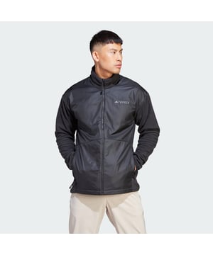 Cool and windy weather is not a problem when you're wearing this adidas wind fleece jacket. It keeps the wind out and the warmth in, so you can focus on the fun of being outdoors. Fleece fabric feels luxuriously soft through day hikes and daily adventures. A woven overlay helps block out cold gusts.Made with 100% recycled materials, this product represents just one of adidas' solutions to help end plastic waste.  - This model is 182 cm and wears a size 50. Their chest measures 97 cm and the waist 76 cm. - Regular fit - Full zip with stand-up collar - 100% polyester (recycled) - Wind-resistant - Side zip pockets - Woven overlay  Shipped by adidas