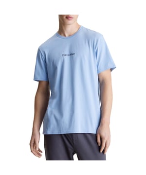 Mens Calvin Klein Crew Neck Lounge T-Shirt in blue.- Ribbed crewneck.- Short sleeves.- Calvin Klein logo printed on the front of the chest.- Top stitching.- Regular fit.- Ref: 000NM2170ECBE