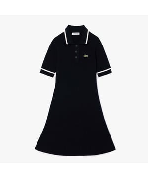 Dames Lacoste Flared Seamless 3D Flat Ribbed Polo Dress Deze getailleerde Lacoste polojurk is een lesje in sportieve stijl gemaakt van een naadloze 3D gebreide stof. Een comfortabel, elegant en flatterend stuk dat met je meebeweegt. Een kenmerkende stijl die perfect past bij je favoriete croc gympen.- Stretch viscose - Plat rib - Fijne contraststrepen - Uitlopende rok - Geborduurde krokodil op borst - Ref: EF7195-HHW
