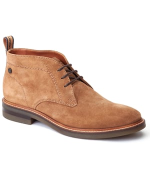 Stride in style with the Knebworth Men's Chukka Boot by Base London. Boasting premium leather uppers, a laid-back 3-lace closure, and a robust nylon pull tab for easy on/off, this Chukka boot features an Orthorlite insole for added comfort.