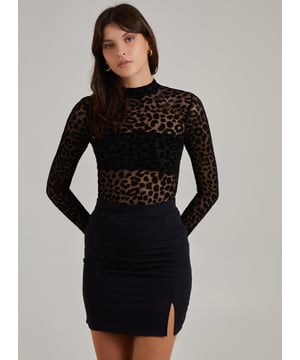 Make a statement this Halloween with this figure-flattering bodysuit. This easy throw on and go option is perfect if you want a more low-key fit for this spooky season.
