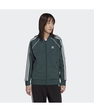 A track jacket like never before. Sure, this may look just like iconic adidas gear from the archive, but this Primeblue SST Track Top symbolizes change. The iconic silhouette is made with Parley Ocean Plastic that's made from upcycled plastic waste collected from ocean shores. It's a statement style that's good for the planet too. Stand up, stand out and join adidas' commitment to help end plastic waste.  - Made of 50% cotton, 43% recycled Polyester and 7% Elastane - Full zip with ribbed collar - 3-Stripes track jacket - Side zip pockets - Ribbed cuffs and hem - Regular fit  Shipped by adidas
