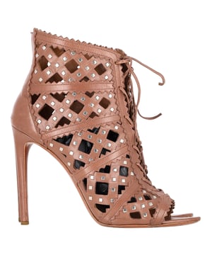 VINTAGE, RRP AS NEW
Exude confidence and sophistication with the Alaïa Laser Cut Lace-Up Peep Toe Heeled Boots, crafted from luxurious brown leather. These striking boots feature intricate laser-cut detailing that creates a stunning, airy effect, adding a touch of modern artistry to the classic lace-up design. The peep-toe silhouette offers a glimpse of the toes, while the sleek, high heel elongates the legs for a flattering, feminine look. Perfect for adding edge to any evening outfit or elevating a casual ensemble, these boots are a statement piece that combines timeless craftsmanship with bold, contemporary design.

 Alaïa Laser Cut Lace-Up Peep Toe Heeled Boots in Brown Leather

Condition: Very good
Signs of wear: Include Box., Minor markings, Lightly used but very well maintained. Minor mark at soles & creasing, light scuffing at the soles and heels.
Packaging: Box
Color: Brown 
Material: Leather | leather
Size: EU | 40/IT40/US10/FR41/UK7
Measurements: Heel height: 120; Insole length: 280
SKU: NAPPUGBSH432468W