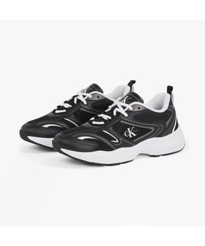 Calvin Klein RETRO TENNIS MESH Womens Trainers Black/Bright White

 Upper Material: Polyurethane

Lining Material: Textile

Sole Material: Rubber

Closure/Fastening: Lace-Up

Features: Comfort,Breathable

Toe Shape: Round

Shoe Width: Regular

Item Weight: 0.5 KG

Heel Height: Low (2.5-4.9cm)

Shoe Shaft Height: Low Top

Trainer Style: Casual

Gift Boxed: No
Product Code: YW0YW018070GM