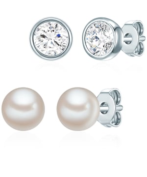 Noble pearl shimmer or glamorous crystal darkness? With this 2-ear sticker set from Rafaela Donata you have the choice every day, because the high-quality earrings in two enchanting variants expand your jewelry box with combination-strong classics. Simple plugs made of 925 sterling silver end in button -shaped freshwater pearls with brilliant luster or in filigree frames, decorated with crystals from Swarovski®. A rhodium coating not only reliably protects the accessories from the start, but also gives the jewelry to the trendy cool silver gloss.
