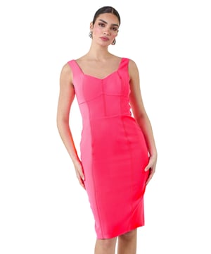 A-Plain Corset Drs from Roman. Get ready to be the best-dressed guest this season in our striking Ariella stretch dress. This knee-length stunner features a bold pop of colour and mock corsetry detailing that creates a flattering fit. The cute sweetheart neckline and feminine, fitted shape make it a special occasion staple, topped off with wide straps for comfort and coverage. Finished with a visible zip back fastening and crafted in stretch jersey fabric, this dress exudes effortless glamour. Pair with strappy heels and a fascinator for a wedding reception or a day at the races this Summer.