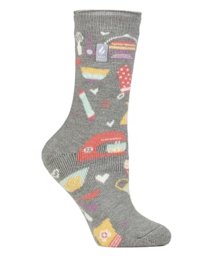 If you know a lady in your life who loves to keep themselves busy with hobbies and activities like baking, reading, gardening or even heading to the great outdoors then these Heat Holders Lite Hobby Socks are made for them!These Heat Holders Lite Hobby Socks are the perfect gift for any woman that loves doing hobbies and activities. They're also warm, comfortable and available in 5 great designs which are: Baking Queen, Positive Vibes, Book Lover, Wild At Heart & Gardening Guru!The Heat Holders Lite Tog rating are scientifically tested to be 5x Warmer than a basic cotton sock, with a tog rating of 1.6 and the Heat Holders Brushing process maximises the amount of warm air held inside each sock for total warmth and all day comfort.Our Specially developed Heat Holders thermal yarn provides high performance insulation against cold with superior moisture breathing abilities. The Heat Holders Loops provide Innovative knitting technology, extra long looped cushion pile to hold in more warm air, increasing the TOG rating.This version of Heat Holders solves the ‘too thick’ element to the original Heat Holders. These Thermal Winter Socks are thin enough to fit into your everyday shoes, but thick enough to still allow Heat Holders’ heat insulation techniques to work.These socks are available in Ladies One Size: 4-8 UK and come in 5 different designs. They are made from: 89% Acrylic, 10% Polyamide, 1% Elastane and are Machine Washable.