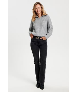Gorgeous winter jumper in two luxurious soft colours. Great for casual looks, or paired with knee high boots for a contemporary stylish look. Super soft cable knit, in an oversize relaxed fit. Model wears a UK XS (is usually a size 8-10). Size down for a more fitted look.

Super soft chunky cable knit
72% Acrylic 25% Polyester 3% Elastane
Zip Neck with collar
26" Shoulder to Hem
Long Sleeve
Sizing: Run large for size
Fit: Oversized Boyfriend Fit