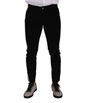 Jeans de denim ajustados 100% auténticos de Dolce & Gabbana  
  Elaborados en algodón  
  Cierre con cremallera y botón  
  Corte ajustado  
  Color negro elegante  
  Detalles de logo  
  Hecho en Italia  
  Composición: 98% algodón, 2% elastano  
Material: 98% algodón, 2% elastano