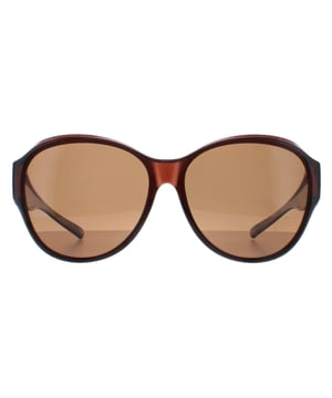 Smarty Round Unisex Transparent Brown EF Brown X2115  Sunglasses Transform your prescription glasses into stylish sunglasses with SMARTY Designer Sunglasses model X2115B, ideal for both men and women. These round-shaped sunglasses feature a trendy transparent brown plastic frame and brown polarized lenses, providing superior UV protection and glare reduction. Designed to fit comfortably over your prescription glasses, the X2115B model offers a seamless blend of fashion and functionality. Available at an exceptional discount from the regular retail price, these designer fit-over sunglasses deliver outstanding quality and value. Upgrade your eyewear collection with SMARTY and enjoy instant, stylish sun protection for less.