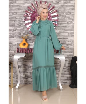 Stoffmerkmal: Hergestellt aus Chiffon-Stoff.Produktmerkmal: Neues Hijab-Modemodell der Saison. Gefüttert. Mit Reißverschluss auf der Rückseite und einem Knopf. Mit Schnürung an den Manschetten. Der Gürtel ist verstellbar. Der Saum ist mit Spitzen verziert. Aufgrund von Konzeptaufnahmen kann es zu leichten Farbunterschieden beim Produkt kommen. Das Model trägt Größe 38. Größenangaben