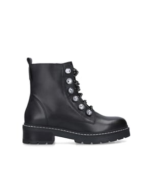 The Bax boot is crafted from a black leather with black metal chain details at the tongue featuring large opaque silver crystal details. Sole height: 4.5cm.