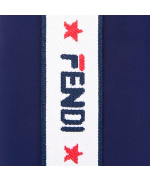 Introducing Fendi's Mania Logo Trim Trousers in Blue - the epitome of high-end Italian craftsmanship and edgy fashion. These unisex trousers truly stand out. Here's why:  Italian Crafted: Fabricated in Italy with authentic detailing and quality, ensuring a lasting luxury appeal and durability. Impressive Logo Details: The 'Mania' logo accentuates the trim, adding a trendy spin and making these trousers a fashion statement. Unrivalled Comfort: Made of premium materials, these trousers promise absolute comfort suitable for any occasion or adventure.  Upgrade your wardrobe with Fendi's Mania Logo Trim Trousers in Blue ‚ a unisex fashion staple. Be bold, order now, and stand out from the crowd!