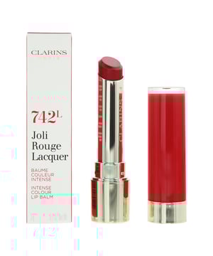 Clarins Joli Rouge Lacquer Lipstick is a high-end and luxurious lipstick that offers a unique combination of vibrant colour, intense shine, and long-lasting wear. This lipstick is known for its rich and vibrant colour payoff. Each shade is carefully crafted to provide bold and lustrous hues that enhance your lips and create a statement look. The standout feature of this lipstick is its high-gloss finish. It imparts a brilliant shine to your lips, giving them a luminous and radiant appearance. The Joli Rouge Lacquer lipstick is designed for long-lasting wear, ensuring your lips remain beautifully coluored and glossy for hours without the need for frequent touch-ups. Despite its intense shine, the formula is lightweight and comfortable to wear. It glides on smoothly, creating a cushiony and hydrating feel on your lips. Clarins often incorporates moisturising ingredients into its makeup products, and this lipstick is no exception. It contains hydrating components that help prevent your lips from feeling dry or chapped. The Clarins Joli Rouge Lacquer Lipstick is versatile and suitable for various occasions, from everyday wear to special events. Its wide range of shades offers options for different skin tones and personal styles. The lipstick comes in a sleek and sophisticated tube with a gold-tone finish, making it a stylish addition to your makeup collection. While it provides intense shine, it also offers a satin-like finish, making your lips appear plump and alluring. The Clarins Joli Rouge Lacquer Lipstick is often dermatologist-tested, ensuring its safety and suitability for various skin types.