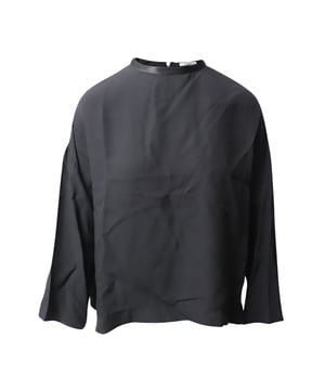 Simple yet sophisticated, this blouse from Ganni will certainly lend elegance and charm to your appearance. It is stitched using black viscose polyester blend and flaunts long sleeves. A zip-type fastening is added to the back. Make an impressive style statement by wearing this.

Ganni Long Sleeve Blouse in Black Viscose
Condition: New with tag
Sign of wear: No
Material: Viscose
Size: M
SKU: 103544