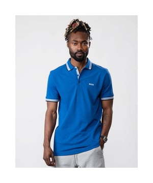 A signature polo shirt by BOSS Menswear, cut to a regular fit. Featuring contrast tipping and a logo at the left chest, this short-sleeved polo shirt is designed in cotton piqué and detailed with further BOSS branding at the undercollar.
Regular fit. Flat-knit collar. Number of buttons: 3. Short sleeves. Flat-knit cuffs. Standard length
100% Cotton
50469055
Model is 5"8 and wears size M