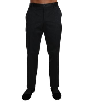 Marca: Dolce & Gabbana.
  Color: Negro con estampado floral.
  Estilo: Pantalones formales.
  Bolsillos: Dos bolsillos delanteros y dos traseros.
  Detalles: Detalles del logotipo.
  Material: Textil brocado (55% algodon 4% elastano 37% poliester 4% seda).