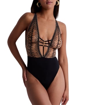 Aubade Voodoo Kiss Bodysuit. Non-wired bodysuit with a low cut back, adjustable decorative straps, gold lurex threads, and a deep plunging neckline. Matching briefs available. This item is recommended for hand wash only.