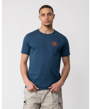 Men’s 1960 Logo T-shirt
Short-sleeved t-shirt in a sustainable jersey knit that combines the softness of organic cotton with the functionality and durability of recycled polyester. Wicks away moisture and dries quickly, making it extra comfortable in warm climates. Round neckline and little logo printed on the chest.

Lightweight and quick drying in warm climates.
60% organic cotton, 40% recycled polyester.
Small logo printed on the chest.
Round neckline.
60% cotton (organic), 40% polyester (recycled)
Organic cotton, Recycled polyester, Produced without PFCs
Regular Fit
Durable, Lightweight, Channels moisture
40°C mild process
do not dry clean
do not tumble dry
do not bleach
iron 1 dot - Max 110°C
do not use fabric softener, wash with similar colours

F87313